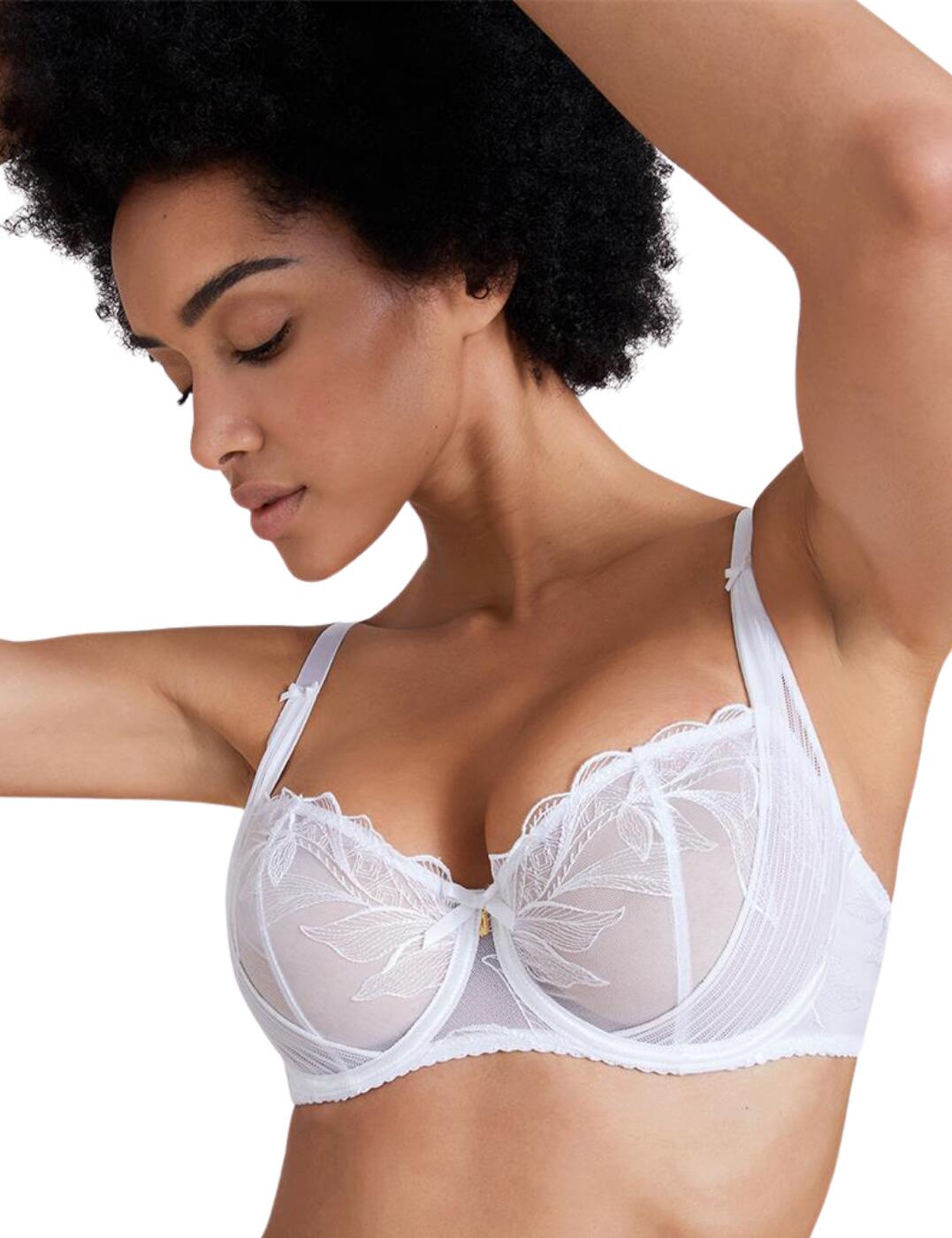 The glamourous Fleur De Tattoo comfort half-cup bra is the perfect flirty new addition to your lingerie collection. This gorgeous bra features mesh cups that are both breathable and comfortable. Fine embroidery adorns the cups giving them a delicate feel, finished with scalloped edges that contour to your curves for a complimentary fit. A supportive side sling supports your curves, keeping them centre for excellent forward projection and a fuller look. The underwiring keeps you feeling comfortable and supported and gives a natural lift. Adjustable hook and eye and shoulder straps allow you to find the perfect fit.  Seductive sheer mesh with feminine embroidery Side sling offers a fuller more rounded look Underwired Adjustable shoulder straps Country of origin: Madagascar Composition: Embroidery: 61% Polyester &pipe; 32% Polyamide &pipe; 7% Elastane Composition: Cup Embroidery: 66% Polyester &pipe; 34% Polyamide Composition: Side Lining: 100% Polyamide Composition: Front Lining: 100% Polyester Composition: Lining back: 69% Polyamide &pipe; 31% Elastane Composition: Tulle: 73% Polyamide &pipe; 27% Elastane Listed in UK sizes  55176-98301-1273500 TB14-2-6 Comfort Half Cup Bra