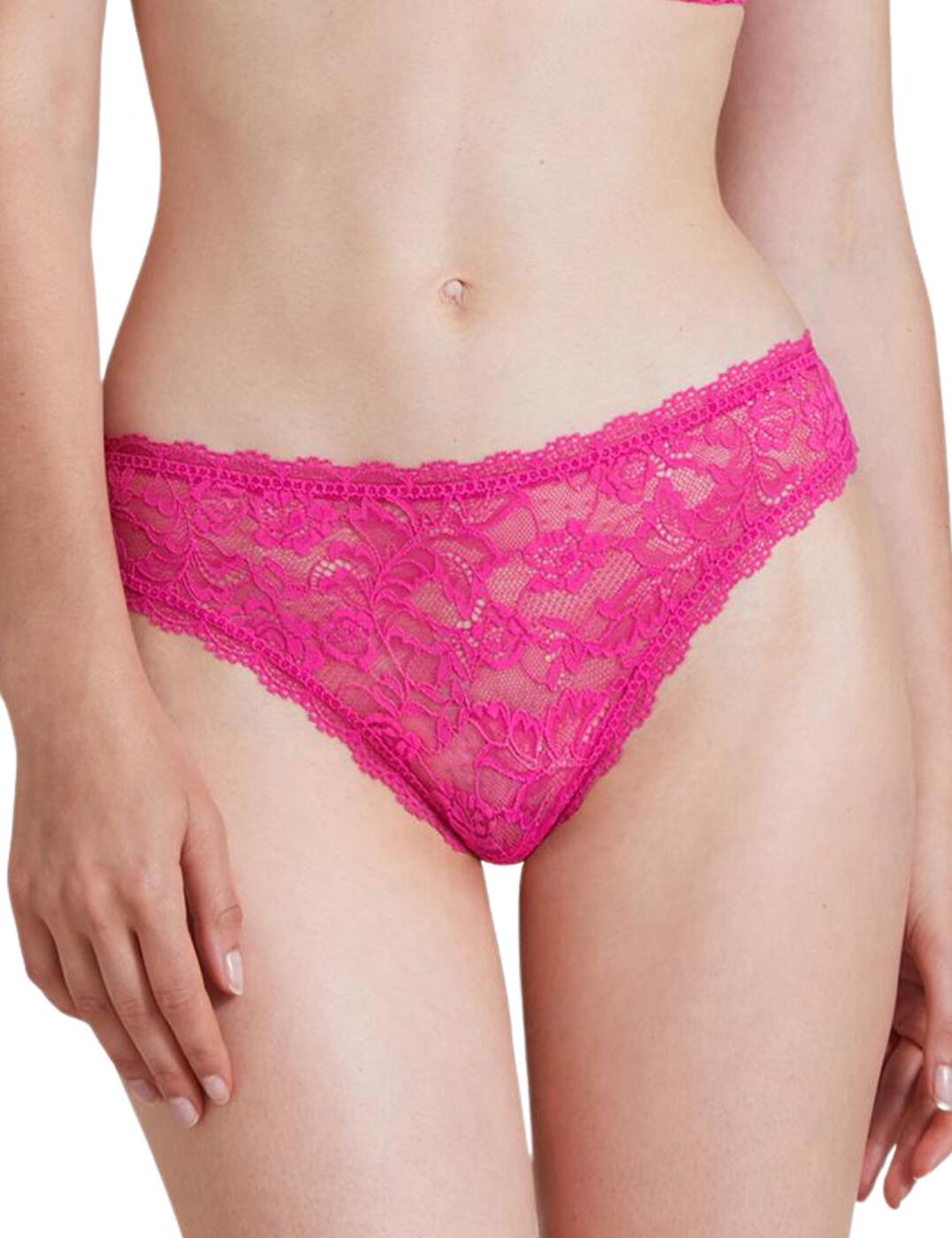 The cheeky style of these tanga briefs combines with a luxurious lace material in the Rosessence collection from Aubade. The mid-rise waist and a classic cut on the front make this piece comfortable to wear, while the minimal rear coverage gives the brief a bit of a sensual feel. The indulgent floral lace covers the design, feeling amazing against your skin, with the delicate scalloped edges finishing off the feminine look.  Seductive tanga style Semi-sheer material with captivating floral embroidery Minimal rear coverage Mid-rise waist Matching coordinates available Country of origin: Madagascar Composition: Front lace - 85% Polyamide &pipe; 15% Elastane Composition: Lace back - 82% Polyamide &pipe; 18% Elastane Composition: Seat - 100% Cotton  Listed in UK sizes  55242-98483-1277013 HK26-6 Tanga Brief