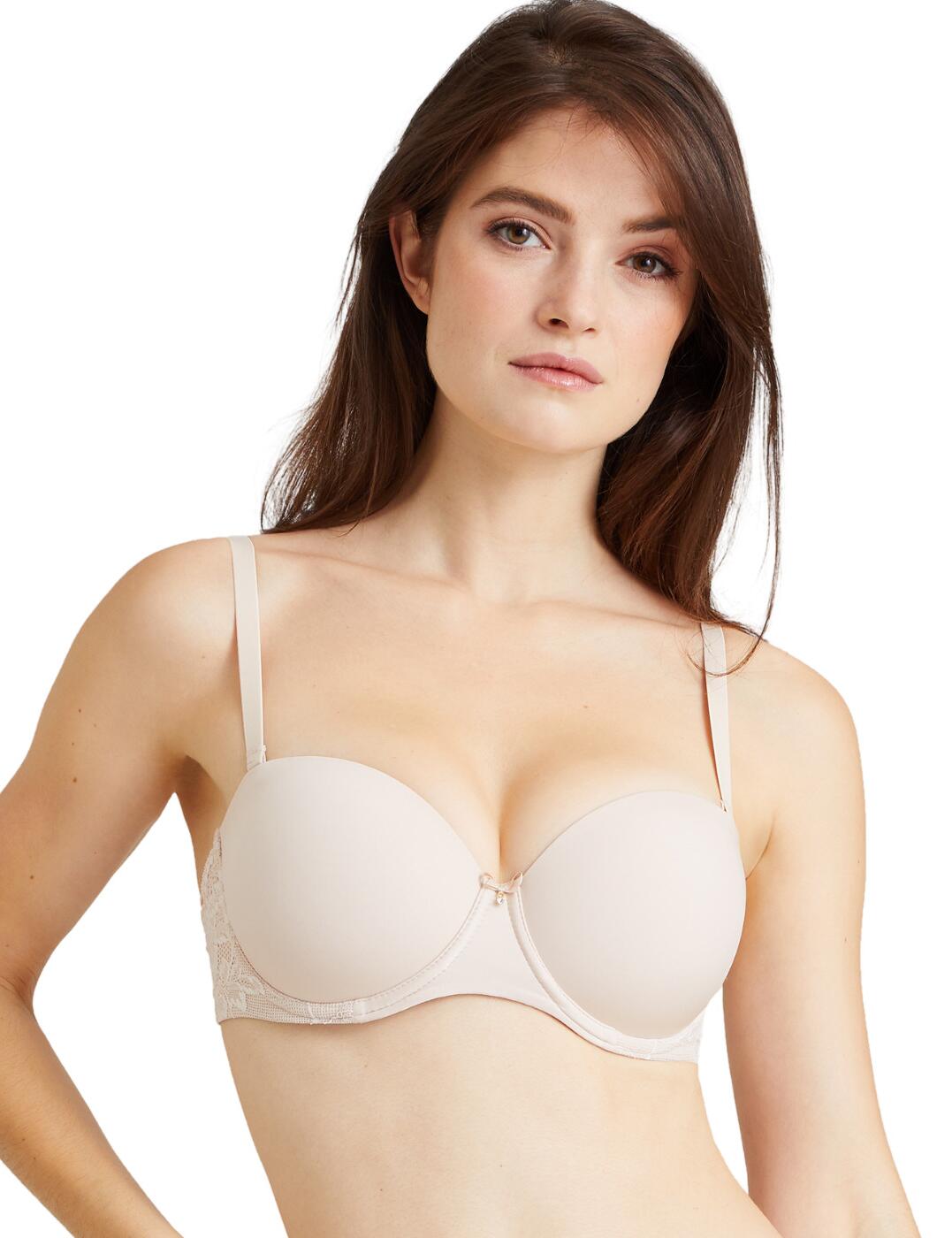 Enjoy superior comfort and chic, feminine style with the Aubade Sweetessence moulded comfort bra. The sleek cups create a seamless appearance under clothing. A neutral design gives this bra a timeless look that you will reach for again and again. Decorative lace adorns the wings adding subtle femininity to this piece. The adjustable shoulder straps can be completely removed or worn as a supportive racerback. Underwired cups help centre the breasts and give you support and lift all day. Pair with your favourite matching lingerie from the Sweetessence collection.  Moulded cups offer a smooth silhouette Multiway shoulder straps Lace detailing on the wings Underwired Country of origin: Tunisia Composition: Lace: 72% Polyamide 28% Elastane Composition Lining: 100% Polyamide Composition Cups: 100% Polyester Listed in UK sizes  55268-98559-1279687 IKN06  Moulded Bra