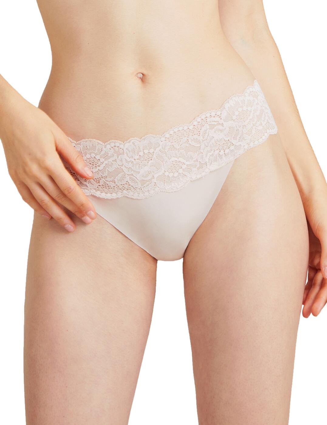 The Sweetessence thong is the perfect addition to your lingerie collection. This flirty but comfortable fit can go for many occasions. A sexy semi-sheer lace waistband gives an alluring glimpse of skin. Soft scalloped edges contour to your body for a complimentary fit that eliminates harsh lines. The soft opaque fabric preserves comfort and modesty while the minimal design highlights your curves.  Flirty semi-sheer lace waistband Minimal rear coverage Minimizes VPL Country of origin: Tunisia Composition: 76% Polyamide &pipe; 24% Elastane Listed in UK sizes  55273-98564-1279705 IK26  Thong