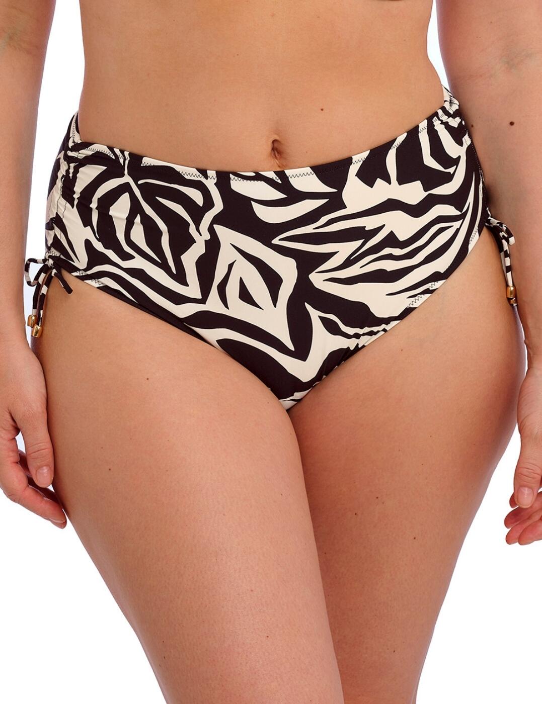 Turn heads by the pool this season with the Aruba Nights high waist bikini brief by Fantasie. Combining timeless design with modern style, these bikini briefs promise to elevate any holiday wardrobe. They boast a high-rise waist and good rear coverage to gracefully accentuate your curves with a secure fit you can reach for time and time again. The adjustable tie sides offer customised wear, allowing you to tailor your swimwear to your taste no matter the occasion. The flattering ruching at the sides adds a touch of sophistication to the feminine print, while full lining ensures all-day comfort and confidence. Wear with matching swimwear from the Aruba Nights collection for head-to-toe beachside elegance.