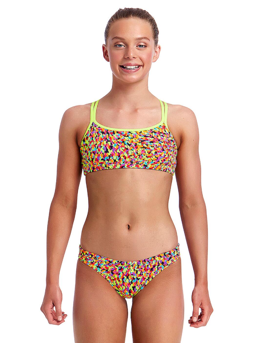 Stand out from the crowd in this season's stunning new Funkita collection! Offering a comfortable fit, this two piece set is plastered in a fun and quirky print that is sure to get you noticed amongst friends! The bikini top has a double strap crossover at the back and the bikini brief offers excellent and firm rear coverage with a hidden drawcord to ensure a perfect fit.  Fun and funky design Comfortable fit Contemporary print 100% Chlorine resistant Two piece set features a bikini top and bikini briefs Hidden drawcord in the brief for a perfect fit! Double strap crossover at the back of the bikini top Built in UV protection Ideal for leisure or training Composition:- 100% Italian polyester Listed in UK sizes  32381-60064-772072 FS33G01977 Criss Cross Bikini Set