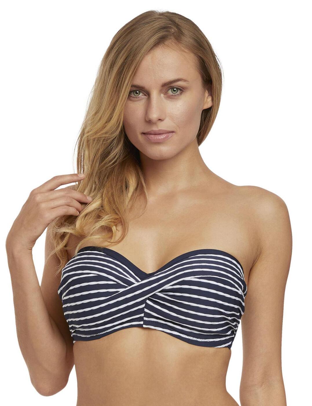 Offering a flattering look, the twist multiway gives you something different. The straps can be removed to rock a popular bandeau style, or worn as standard or cross back. This is a lightly padded and underwired bikini top that is on trend for this season. With lots of interchangeable designs in this range to choose from, you can mix and match to have rock a different look each day!  Lightly padded for shape Adjustable multiway straps Can be worn as a popular bandeau style Underwired support Fastens with a clasp at the back Fabric:- 71% Nylon/Polyamide, 9% Elastane, 20% Polyester Listed in UK sizes     32493-60322-779409 6504 Twist Bandeau Bikini Top