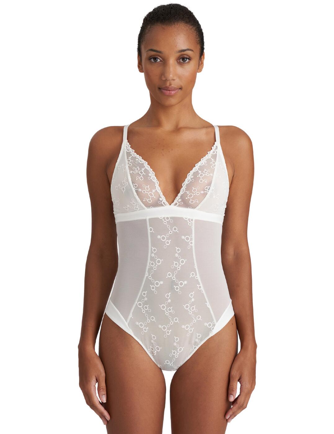 Whether you wear a bodysuit out or to create a sexy nighttime look, this one from the Nellie range by Marie Jo is a must-have! This body is crafted from a semi-sheer fabric that covers the bodysuit whilst some sections feature the Nellie patterned embroidery to add a chic touch to a classic design. You are sure to be the centre of attention in this with the plunging cups, eye-catching embroidery and flirty cut-out at the back. The cups showcase your cleavage and keep a natural feeling with non-padded cups and no underwiring. Like always with Marie Jo, it guarantees a comfortable fit with a mini hook and eye closure and adjustable straps.